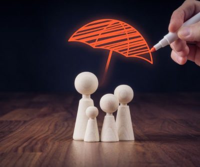 people with an umbrella over them